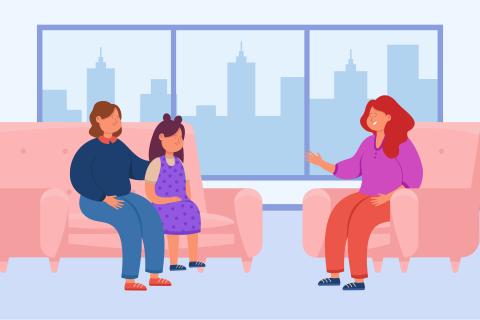 Counsellor talking to mother and child