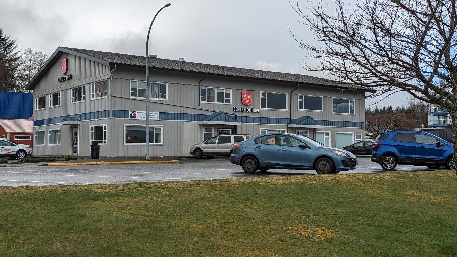 Building surrounded by parking lot